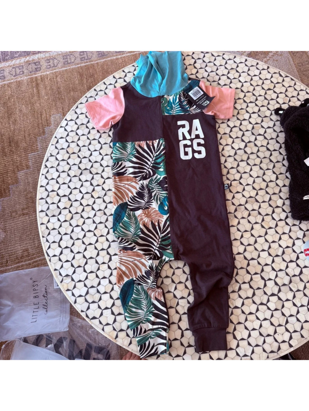 Rags to raches Hawaiian romper